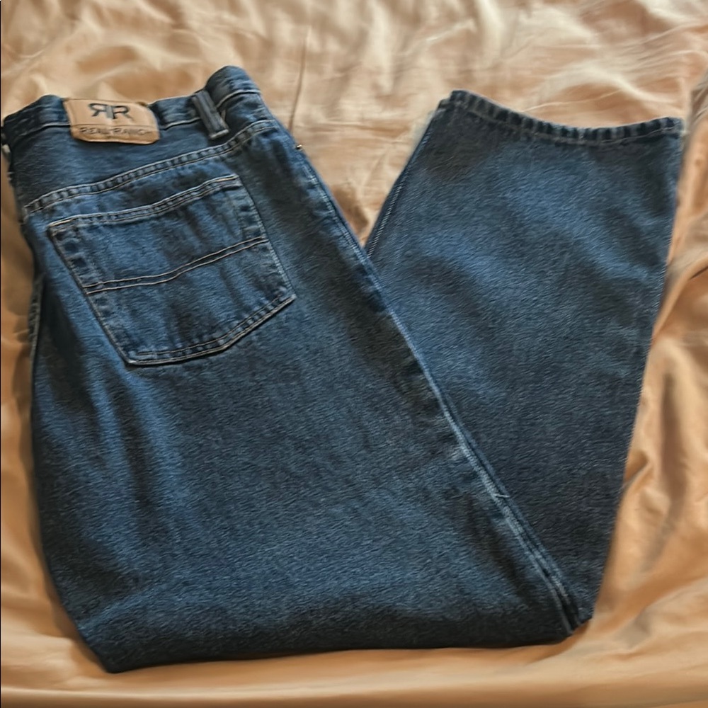 Relaxed Blue Denim Jeans with Subtle Fading